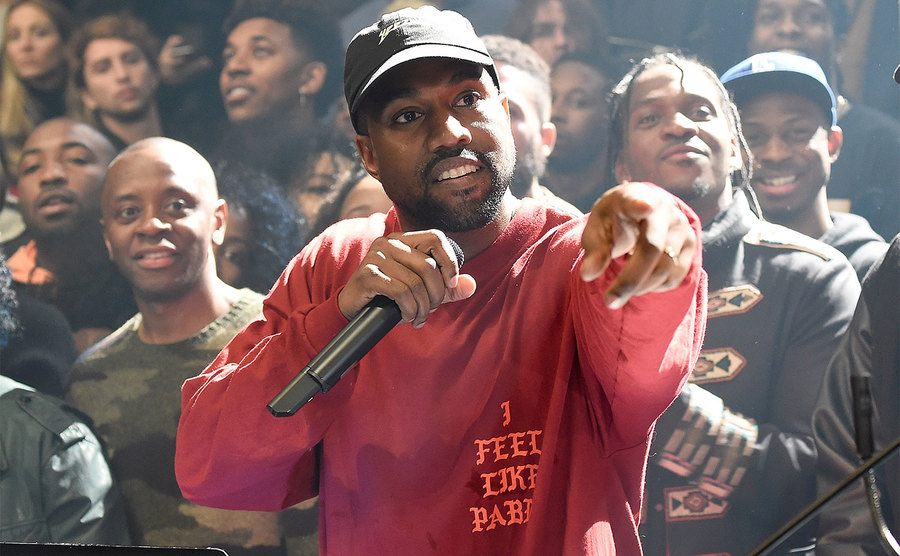Kanye West speaks on stage during Kanye West Yeezy Season 3.