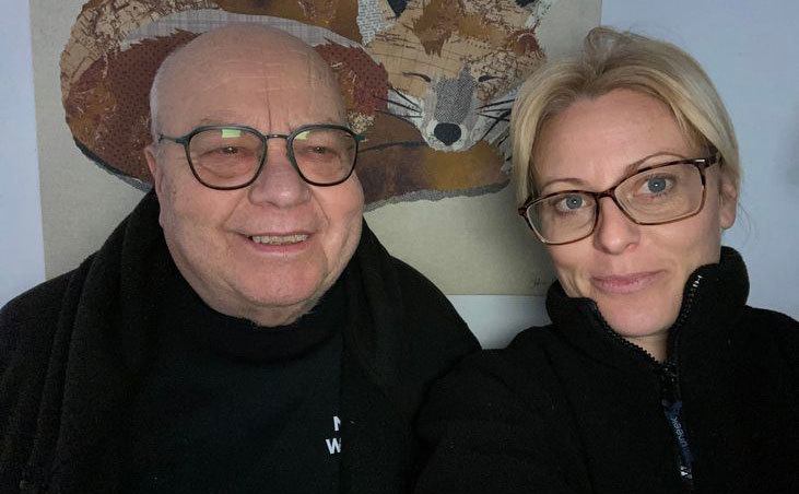 Geoff Grewcock and his wife pose for a photo.