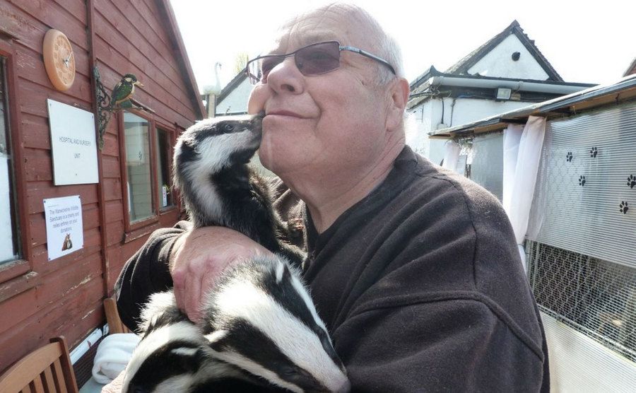 Geoff Grewcock embraces the animals in his sanctuary.