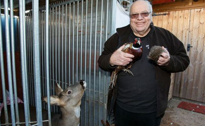 Geoff Grewcock tends to the animals in his sanctuary.