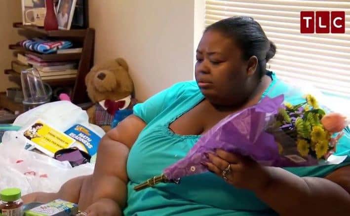 An obese woman talks about her life.