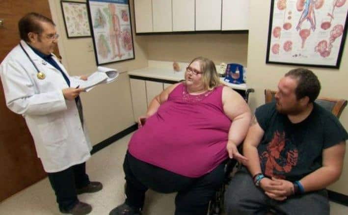 Dr. Now is talking to patients in his office.