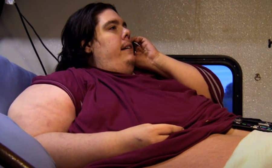 Steven Assanti is talking on his phone.