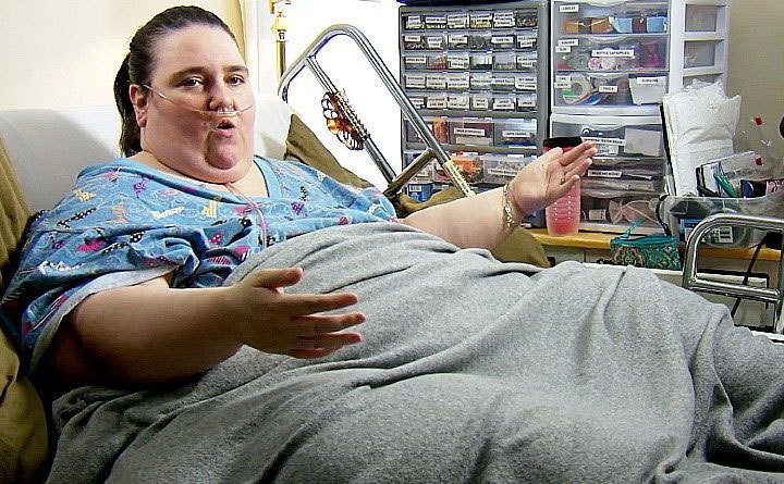Penny Saeger is seen in bed.