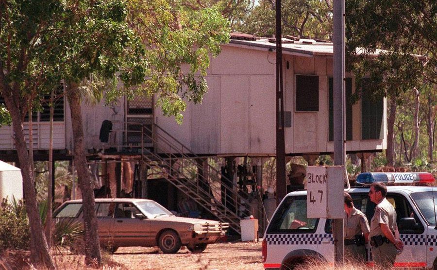 Police stand outside Ansell’s location.