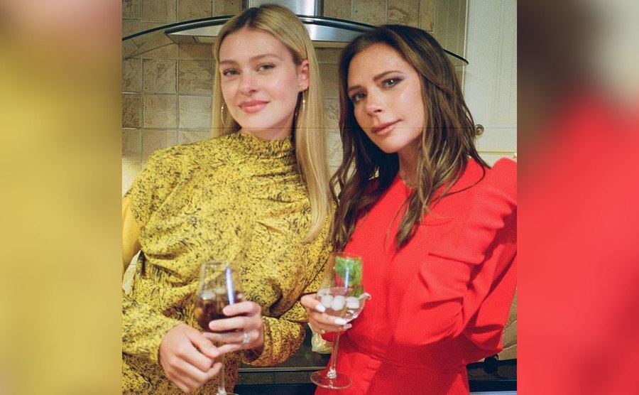 Nicola Peltz and Victoria Beckham have a drink at home.