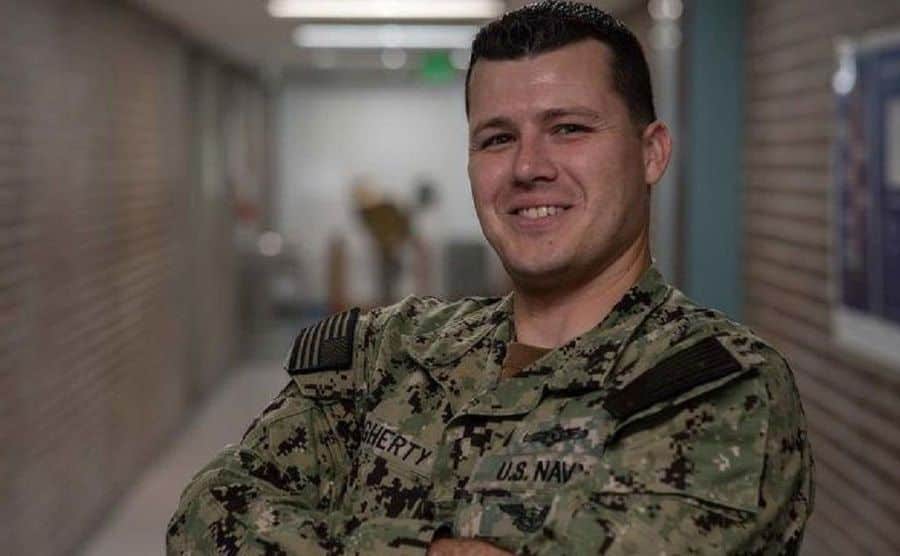 Chris poses in his Navy uniform.