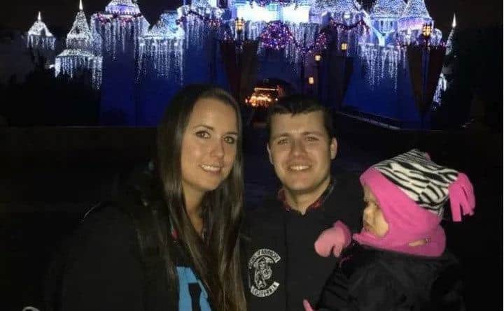 Natasha and Chris are at Disneyland.
