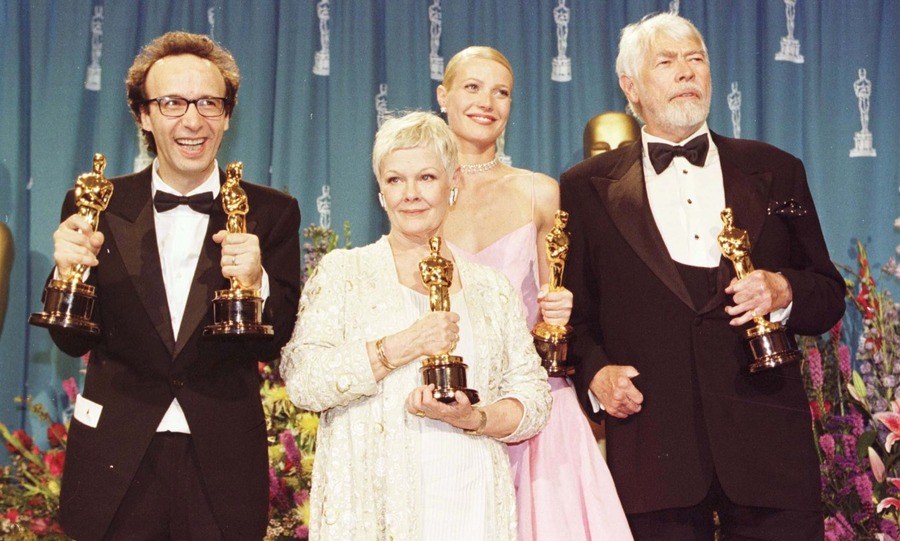Oscar winners with trophies