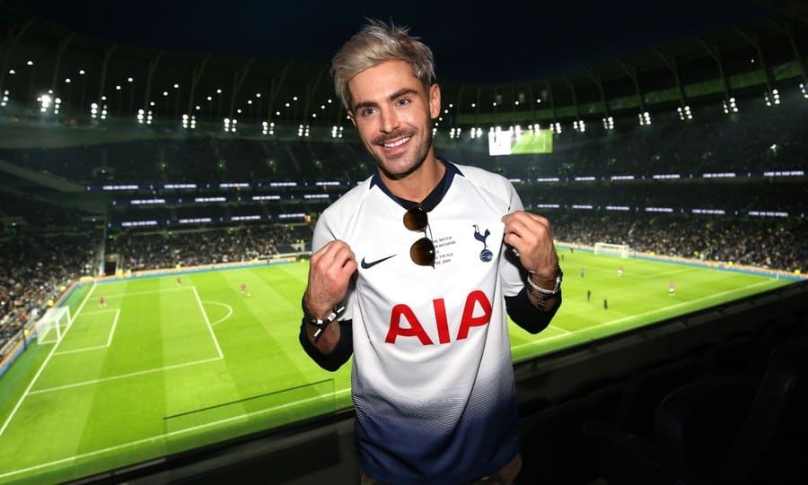 Actor Zac Efron poses for a photo during a Premier League match