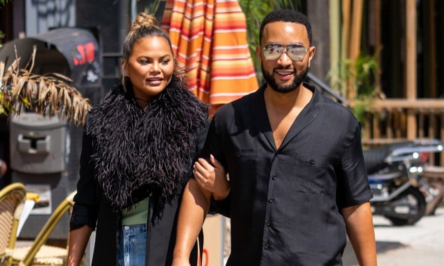 Chrissy Teigen (L) and John Legend