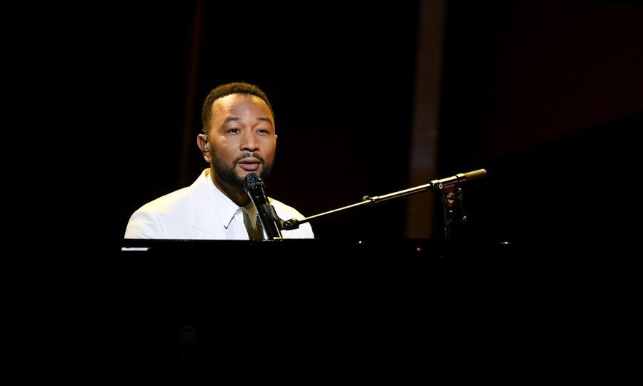 John Legend performs onstage at the 2020 Billboard Music Awards