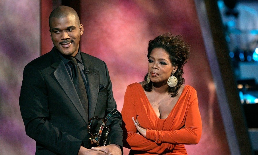 Actor Tyler Perry (L) and TV personality Oprah Winfrey